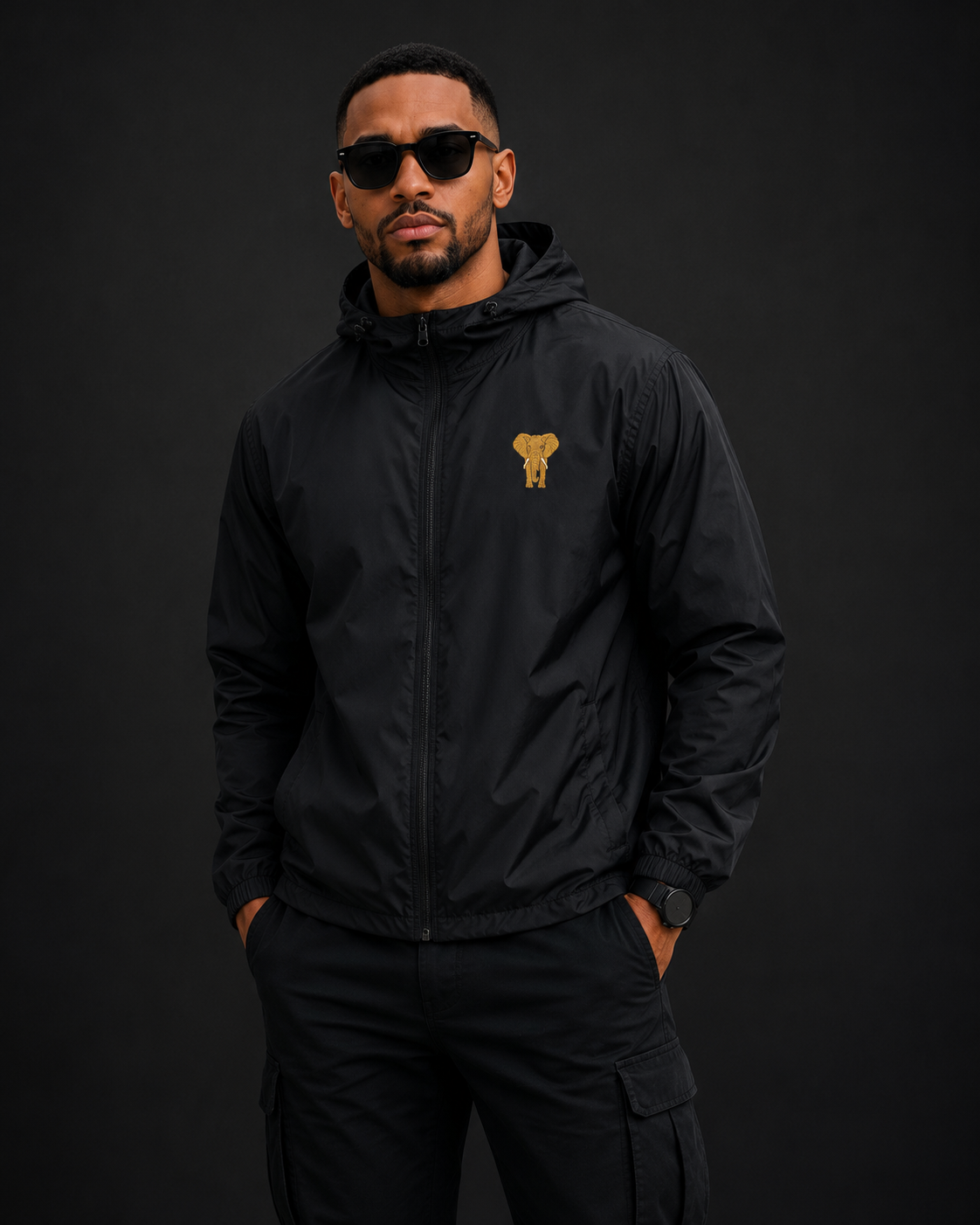 Male model wearing a black Royal Seriti windbreaker jacket